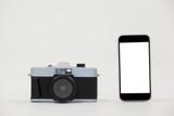 Fototapeta  - Close-up of camera and smartphone