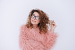 © Drobot Dean - Woman in glasses and fur coat