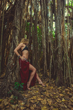 Girl In Ethnic Dress On A Background Of The Sacred Banyan