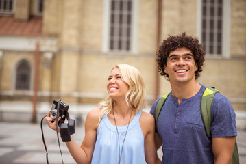 Happy couple on a city tour