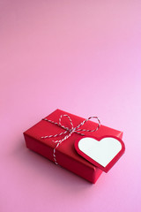 Gift on Valentine's Day, Valentine heart. Pink background copy s