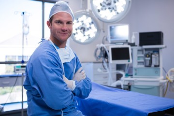 Poster - Portrait of male surgeon sitting in operation theater