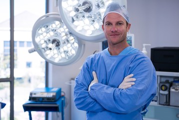 Poster - Portrait of male surgeon standing in operation theater
