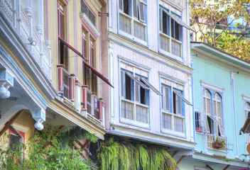 View of the second floor of some old houses and its windows, in Las Peñas neighborhood, Guayaquil, Ecuador