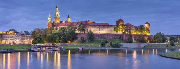 Wall Mural - Golden lights of old castle in evening 