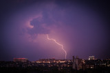 Fototapeta Tęcza - Lightning over the city