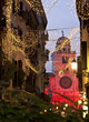 The clock tower in Piazza dei Signori in Padua, Italy, with christmas lights.