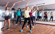 © JackF - Men and ladies dancing zumba