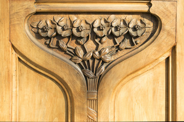 Archietecture detail of Art Nouveau. Door with floral ornament
