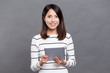 © leungchopan - Woman using digital tablet computer