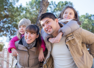 Portrait of happy family outdoors