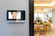 © zhu difeng - intercom video door bell on wall outside modern dining room