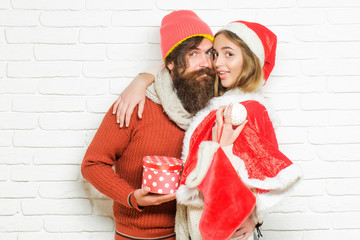 Wall Mural - Young smiling Christmas couple