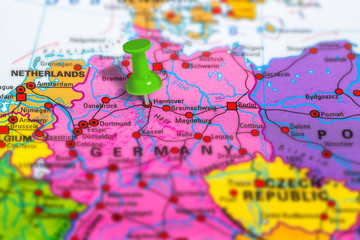 hannover in Germany pinned on colorful political map of Europe. Geopolitical school atlas. Tilt shift effect.