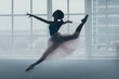 © Stanislav - Ballerina in the jump in front of a window