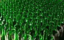 Stack Of Empty Green Glass Bottles