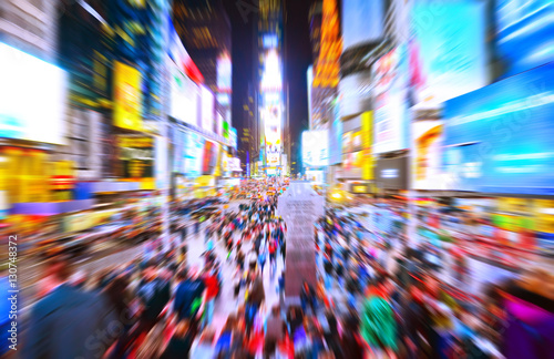View of Times Square at night in New York City with motion effect Poster