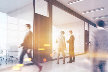 Wall Mural - People walking in business center lobby