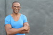 © ajr_images - Black man posing with crossed arms and wearing glasses