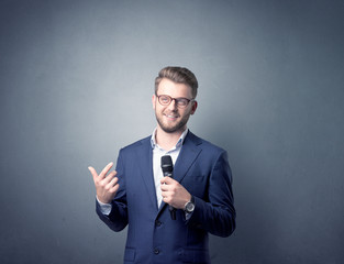 Businessman holding microphone
