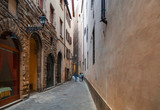 Fototapeta Uliczki - narrow street in historic district of Florence