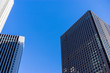 © Sean K - Modern Office Buildings Against Blue Sky