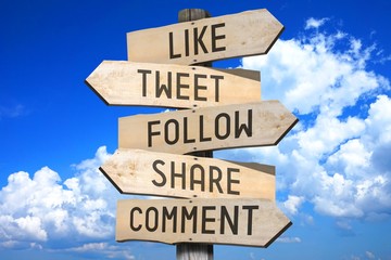 Wall Mural - Wooden signpost - social media concept (like, tweet, follow, share, comment) - great for topics like communication etc.