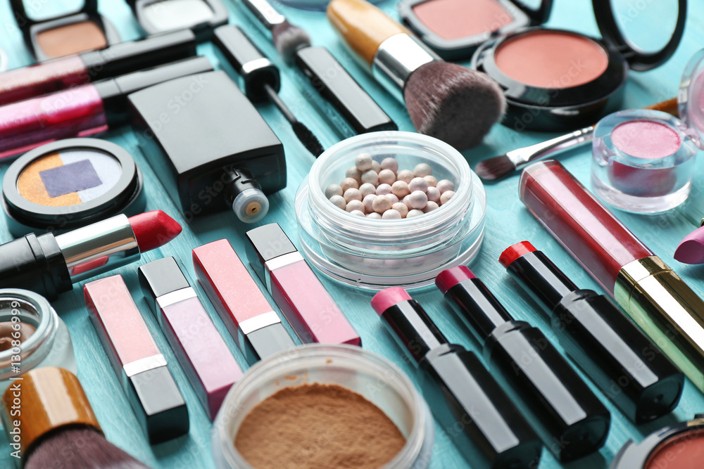 Set of decorative cosmetics on wooden table