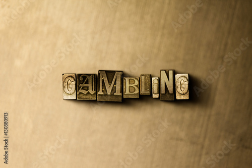 фотография GAMBLING - close-up of grungy vintage typeset word on metal backdrop