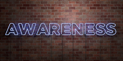 awareness - fluorescent neon tube sign on brickwork - front view - 3d rendered royalty free stock pi