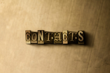 contacts - close-up of grungy vintage typeset word on metal backdrop. royalty free stock - 3d render
