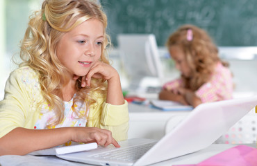 Wall Mural - beautiful little girls at class