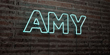 AMY -Realistic Neon Sign On Brick Wall Background - 3D Rendered Royalty Free Stock Image. Can Be Used For Online Banner Ads And Direct Mailers..