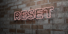 RESET - Glowing Neon Sign On Stonework Wall - 3D Rendered Royalty Free Stock Illustration.  Can Be Used For Online Banner Ads And Direct Mailers..