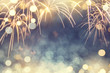 Gold and green Fireworks and bokeh in New Year eve and copy space. Abstract background holiday.
