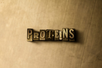 proteins - close-up of grungy vintage typeset word on metal backdrop. royalty free stock - 3d render