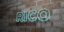 RICO - Glowing Neon Sign On Stonework Wall - 3D Rendered Royalty Free Stock Illustration.  Can Be Used For Online Banner Ads And Direct Mailers..