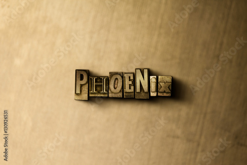 Phoenix Close Up Of Grungy Vintage Typeset Word On Metal