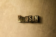 CHOSEN - close-up of grungy vintage typeset word on metal backdrop. Royalty free stock - 3D rendered stock image.  Can be used for online banner ads and direct mail.