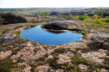 Poster - Country landscape with small pool and hills