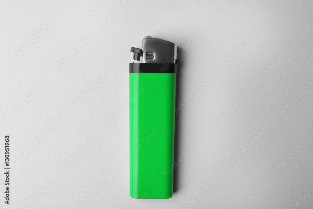 Blank green cigar lighter on white background