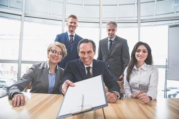 Canvas Print - Group of professionals is smiling