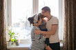 © natalialeb - happy family with  son kid toddler playing near window real inte