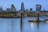 Fototapeta  - LONDON, ENGLAND - JUNE 17 2016: Night Photo of Thames River and skyscrapers,  London, Great Britain