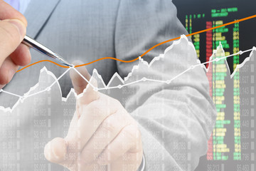 Fototapete - Businessmen analyzing financial chart on virtual screen