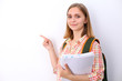 © rogerphoto - Happy young student girl holding books, study, education, knowledge, goal concept