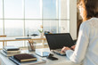© undrey - Businesswoman typing on laptop at workplace Woman working in home office hand keyboard