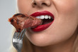 © puhhha - Eating Meat. Closeup Of Sexy Woman's Mouth Biting Tasty Meat