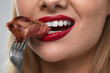 © puhhha - Eating Meat. Closeup Of Sexy Woman's Mouth Biting Tasty Meat