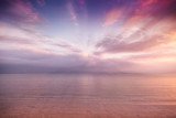 Fototapeta Zachód słońca - Beautiful blurred background with bright pink blurred sunset on